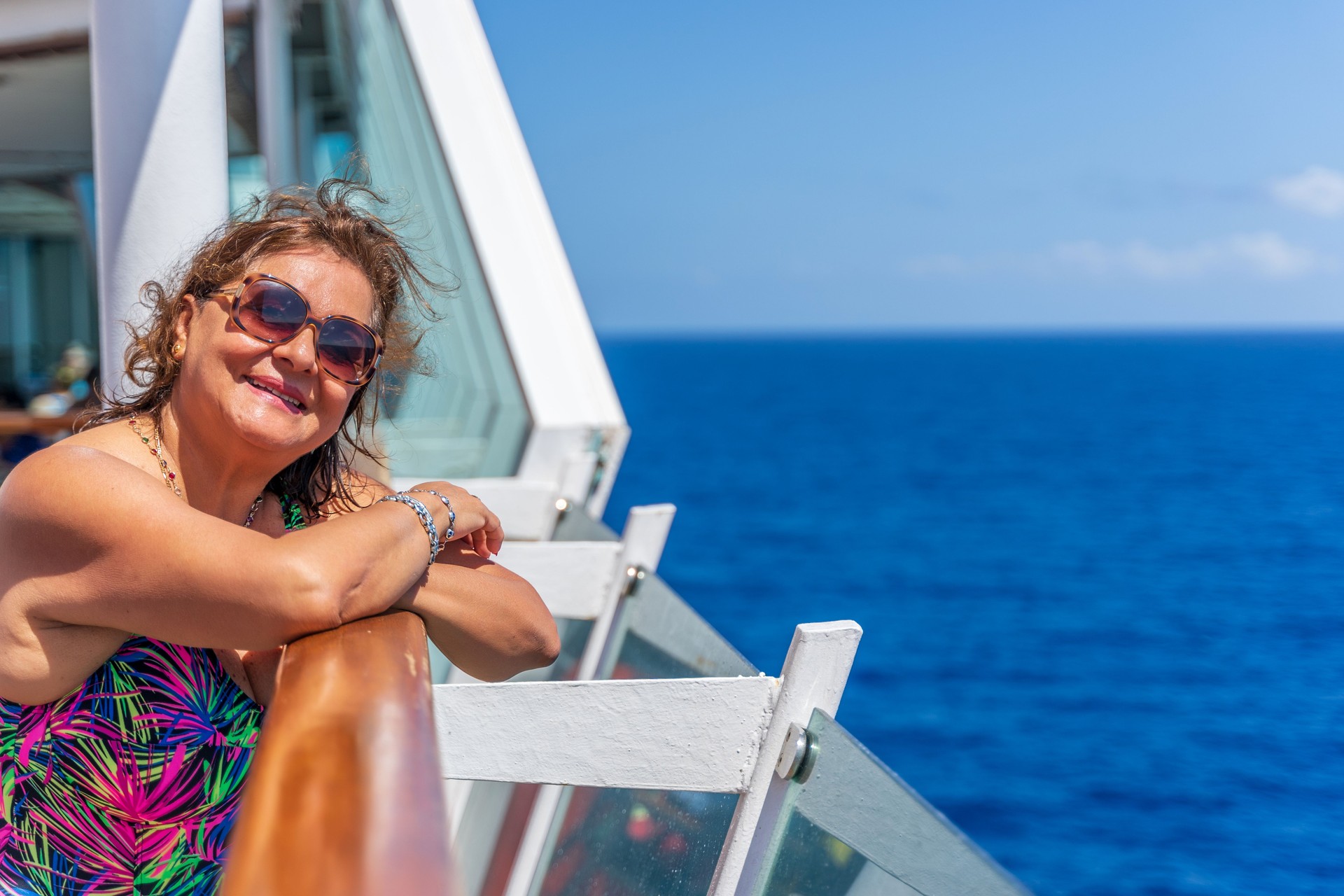 Senior Hispanic woman at sea